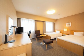 Down comforters, desk, laptop workspace, blackout drapes