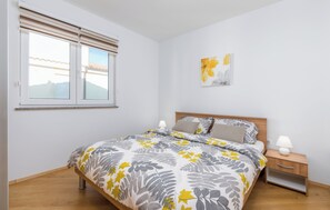 2 quartos, Wi-Fi de cortesia, roupa de cama