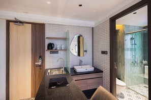 Deluxe Double Room, 1 King Bed, Kitchenette | Bathroom | Shower, hair dryer, slippers, towels - Enjoy Apartment Hotel (Da Lat)