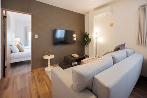 Studiosvit för familj - 2 sovrum - icke-rökare | Individuell inredning, unika möbler och mörkläggningsgardiner