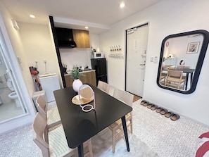 Family Twin Room, 2 Double Beds, Non Smoking | In-room dining
