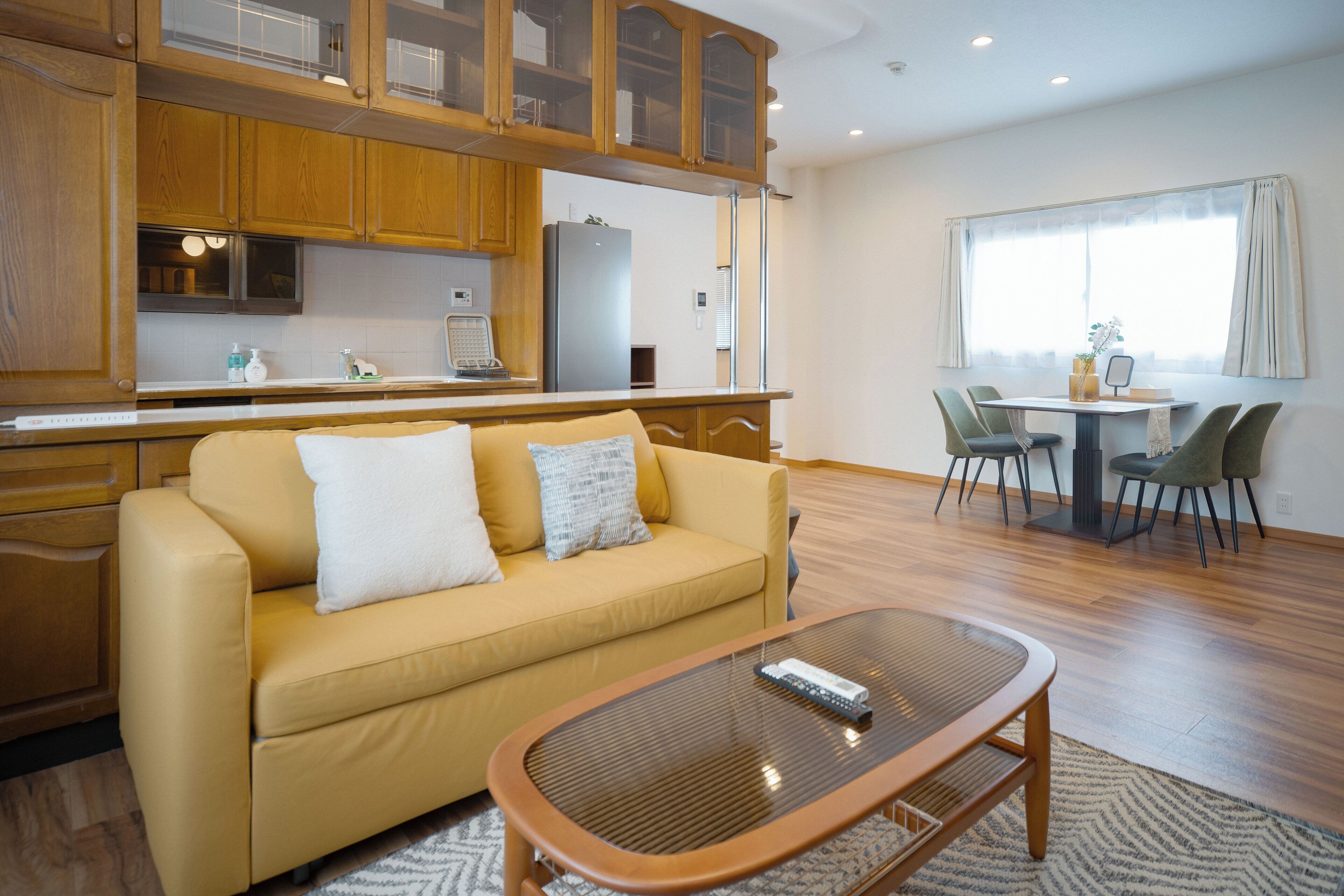 Deluxe Apartment | Living area | 43-inch TV with cable channels