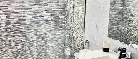 Hair dryer, towels, soap, toilet paper