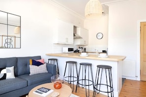 Appartement Standard | Coin séjour | Télévision à écran plat