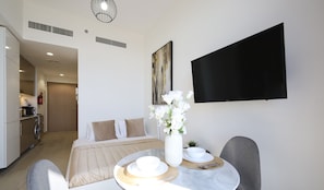 Studio, City View | 1 bedroom, in-room safe, blackout drapes, iron/ironing board