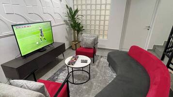 Family Apartment, Balcony, City View | Living area