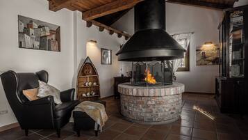 Villa, Garden View | Living area | 32-inch flat-screen TV with cable channels