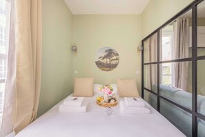 1 chambre, fer et planche à repasser, Wi-Fi gratuit, draps fournis