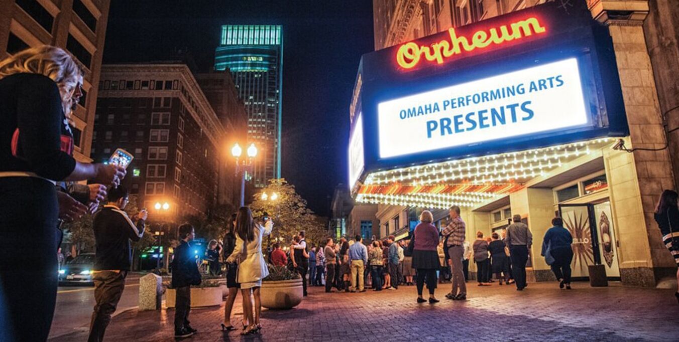 A marquee sign for the Orpheum theater advertising Omaha Performing Arts Presents.