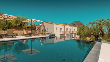Outdoor pool, pool umbrellas, pool loungers