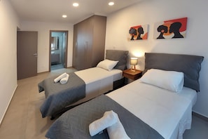 4 bedrooms, in-room safe, iron/ironing board, travel cot