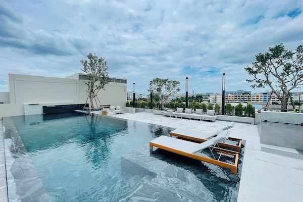 Outdoor pool, sun loungers