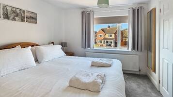 4 bedrooms, iron/ironing board, travel cot, WiFi