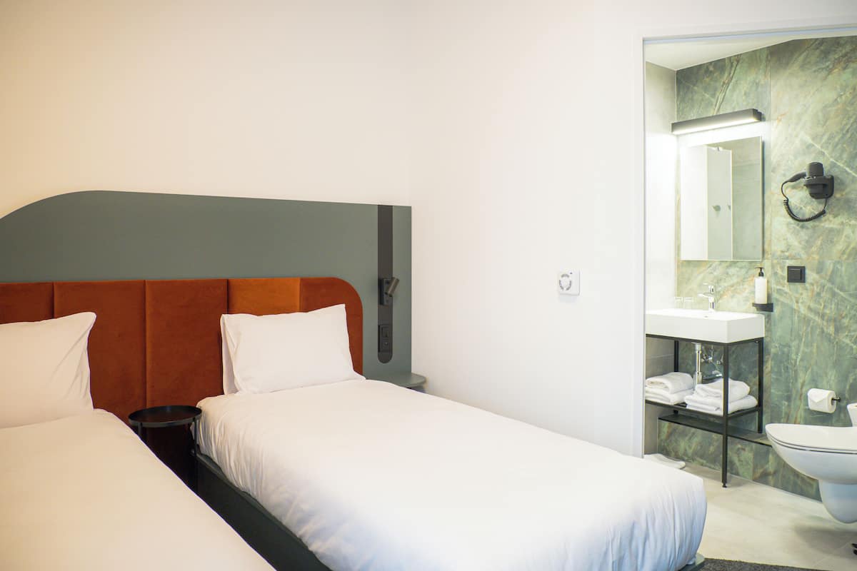 Twin Room | Desk, blackout drapes, free WiFi, bed sheets
