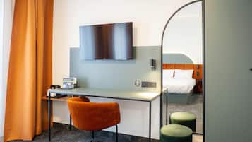 Desk, blackout curtains, free WiFi, bed sheets