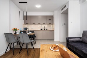 Family Apartment, Balcony, City View | Laptop workspace, blackout curtains, iron/ironing board, free WiFi - Pileckiego Residence (Warsaw)