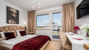 Comfort Studio Suite, Balcony, City View | 1 bedroom, laptop workspace, blackout curtains, iron/ironing board