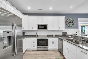 Fridge, microwave, dishwasher, coffee/tea maker
