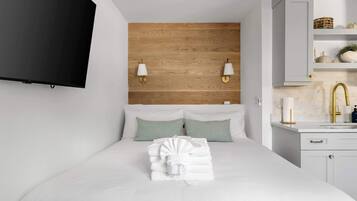 1 habitación, tabla de planchar con plancha, cuna de viaje y wifi