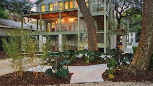 A multi-story house with a balcony and a staircase. - Large, Upgraded 3bd with Parking, steps to beach! (Folly Beach)