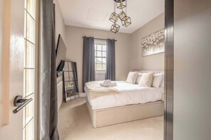 1 غرفة نوم ومكواة/لوح كي وواي فاي وملاءات أسرّة