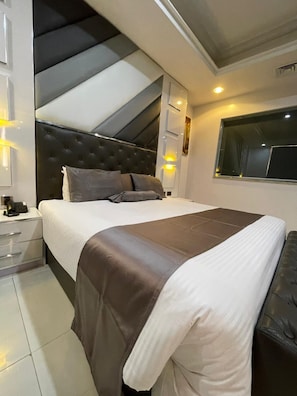 In-room safe, desk, laptop workspace, iron/ironing board