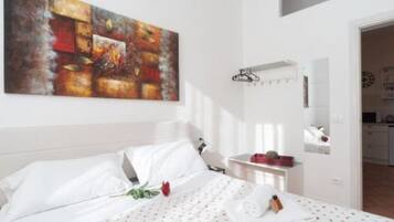 2 chambres, coffres-forts dans les chambres, fer et planche Ă  repasser