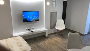 1 slaapkamer, een strijkplank/strijkijzer, wifi, beddengoed