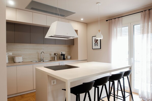 Fridge, stovetop, electric kettle, toaster