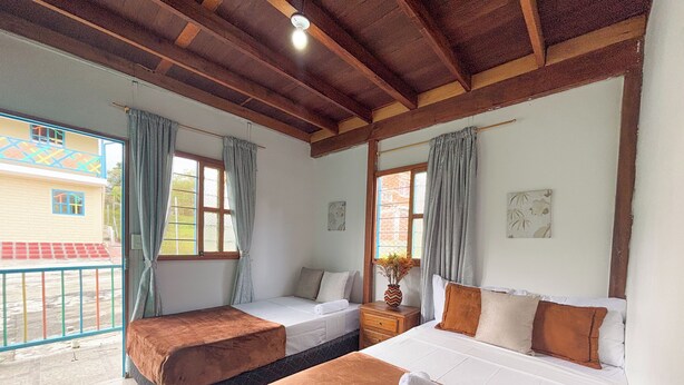 Classic Triple Room, Courtyard View | WiFi (free) - Las Casas de Tomate (Guatapé)
