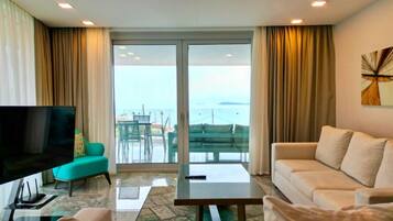 Apartamento luxo, vista para o mar | Área de estar