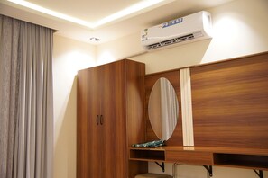 Luxe beddengoed, pillowtop-bedden, een kluis op de kamer
