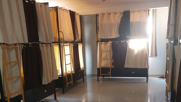 Economy Shared Dormitory, Balcony, Garden View | Living area - SH Bar & Restaurant (Chirawa)