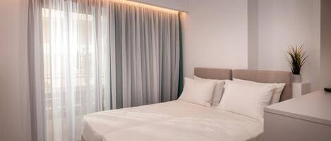 2 habitaciones, tabla de planchar con plancha, wifi y ropa de cama