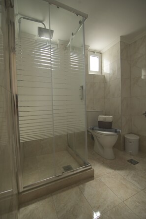 Hair dryer, towels, soap, toilet paper