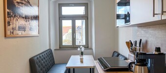 Central apartment for 4 people with kitchen, WiFi & private parking space