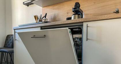 Zentrales Apartment für 4 Personen mit Küche, WLAN & privatem Parkplatz