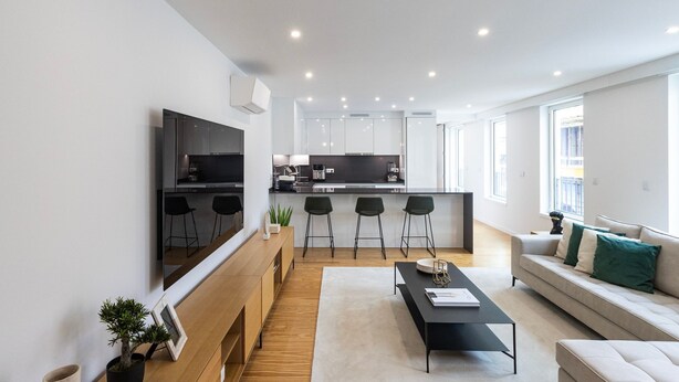 A modern apartment with a kitchen, dining area, and living room. - Morro Premium Apartment w/ Free Parking (Vila Nova de Gaia)