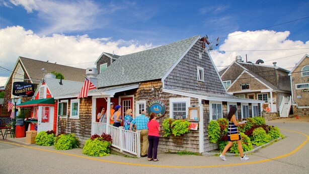 A wooden building with a sign for 'Foot Bridge Lobster' and a 'Lobster Shack' sign.
