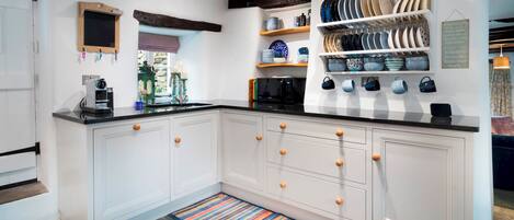 Fridge, microwave, dishwasher, coffee/tea maker