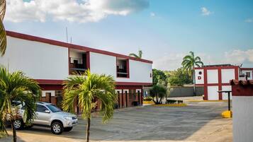 Classic Triple Room, Garden View | Terrace/patio