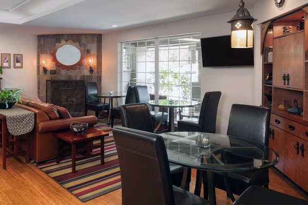 Unwind by the fireplace and linger over conversation and comfort.