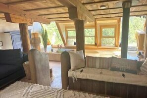 TV, fireplace - Peaceful Mt Top Earthship Retreat w/ Sauna & Views (Taos County)