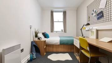 Cortinas blackout, tabla de planchar con plancha y wifi gratis