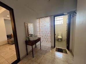 Shower, towels, soap, toilet paper