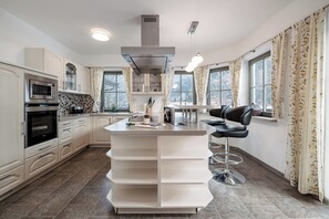 Traditional Chalet, Mountain View | Private kitchen | Electric kettle, toaster - Chalet Pirchhof by MYALPS (Sautens)