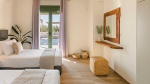 A bedroom with two beds, a wooden ceiling, a large window with curtains, a mirror, and a view of the outside.