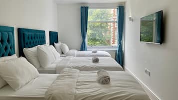 Suite Deluxe, baño en la habitación | 1 habitación y wifi gratis