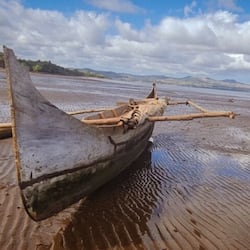 On the beach, kayaking
