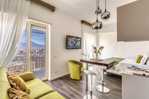 Comfort Apartment, Balcony, City View | Living area | TV - Timeless (Naples)